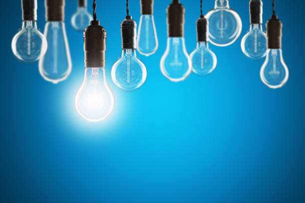 istock Idea and leadership concept - bulbs on the grunge background 1124517365
