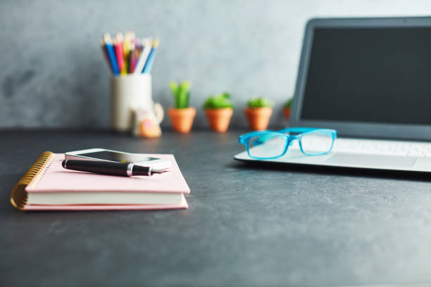 Work desk with phone, keyboard and accessories