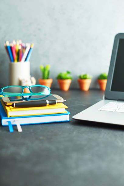 istock Work desk with vibrant accessories and cacti 1124518945