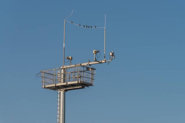 istock Surveillance cameras and antennas on a steel pole, Germany 1124519550