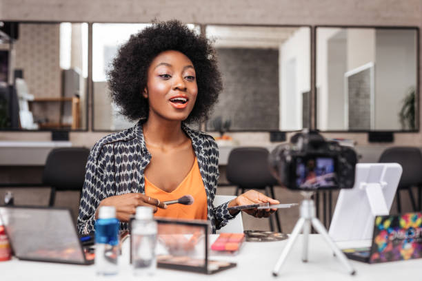 istock Cute dark-skinned woman with coral lipstick taking looking enthusiastic 1124520168