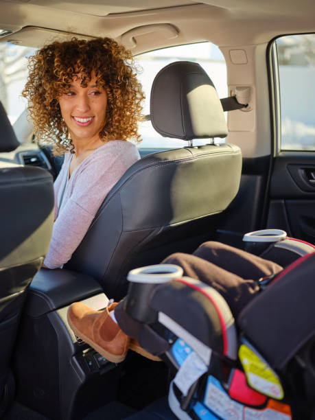 istock Woman in Car with Little Boy 1124522214