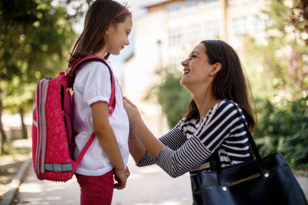 istock Mother taking daughter to school 1124522491