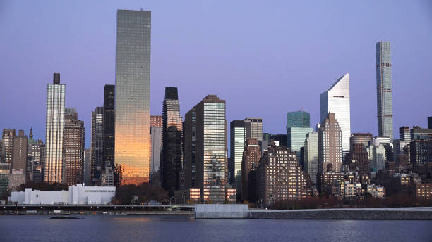 istock New York City midtown Manhattan sunset skyline panoramic view over Hudson 1124522769