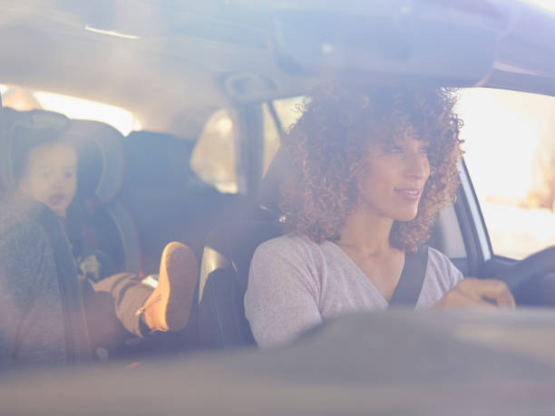 istock Woman in Car with Little Boy 1124522830