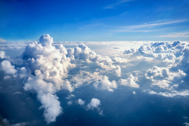 istock cloudscape from above, aerial view of blue sky and white cloud 1124524023