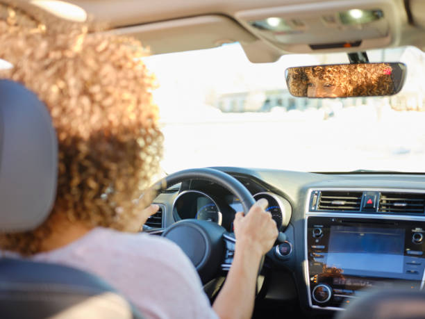 istock Woman Driving Car 1124524071