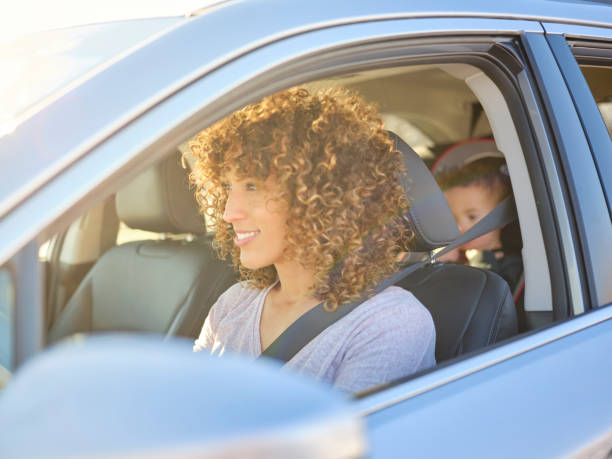 istock Woman in Car with Little Boy 1124524377