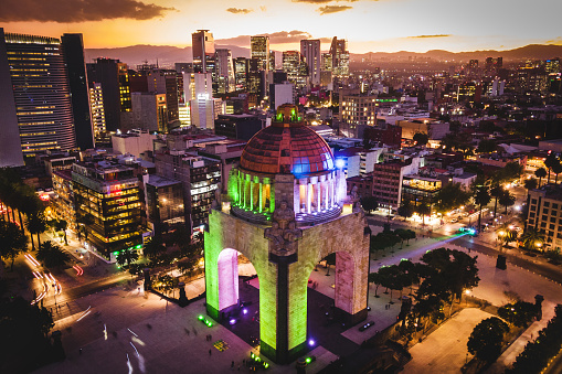 Mexico City, Mexico, aerial view of Plaza de la Republica and Mexico City skyline at dusk.