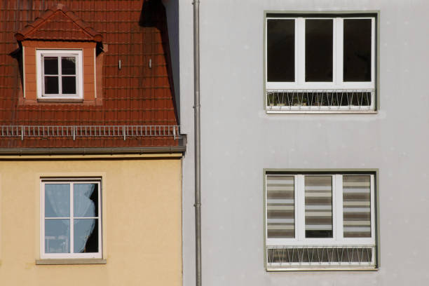 istock Windows of different kinds. Modern classic architecture with mixture of window shapes and facade styles. 1124528351