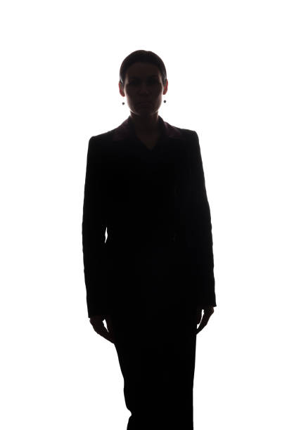 istock Young woman in suit, front view - silhouette 1124528642