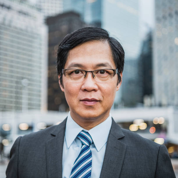 istock Mature Chinese businessman looking at camera 1124528897