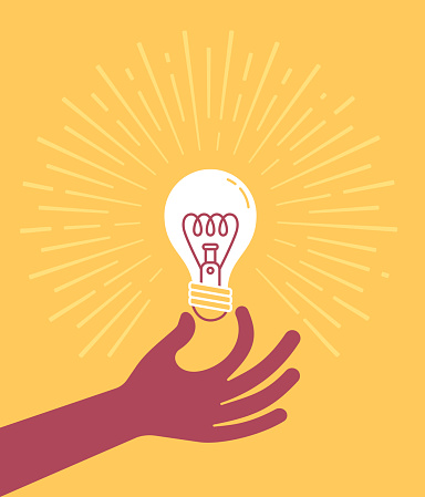 Hand holding a light bulb thought, intelligence, brainstorming and invention concept illustration.