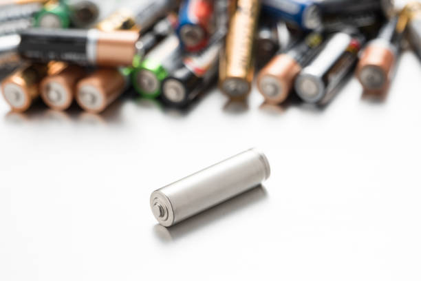 istock Universal battery compared to other batteries on a white background 1124529873