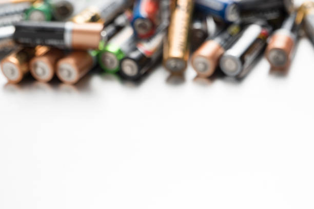 istock Background of defocused batteries with space for text. 1124529903