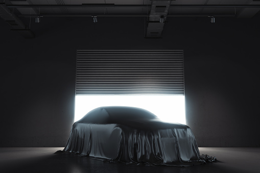 Presentation of the car covered with black cloth on dark illuminated background. 3d rendering