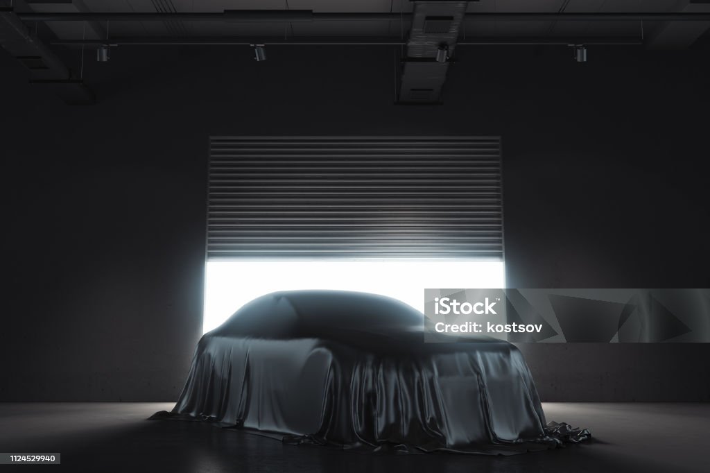 Presentation of the car covered with black cloth. 3d rendering Presentation of the car covered with black cloth on dark illuminated background. 3d rendering Car Stock Photo