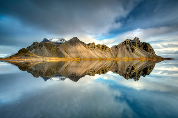 istock stokksnes mountains reflected in Icelandic 1124534342