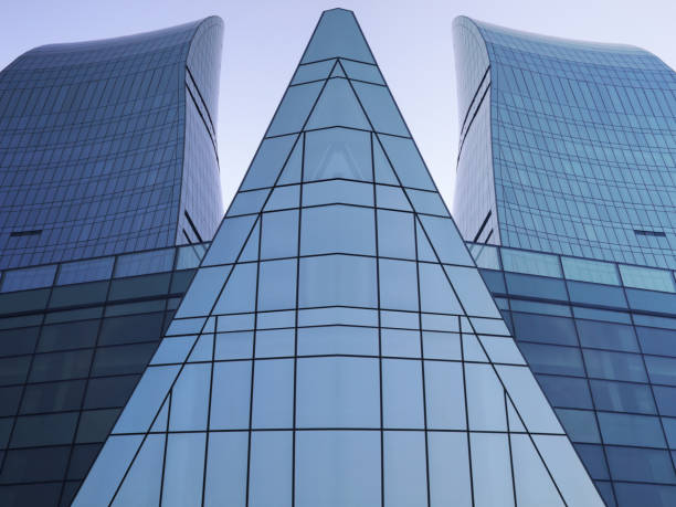 istock Computer graphic image of skyscrapers with structural glazing. Realistic though unreal object of modern architecture. 1124535036