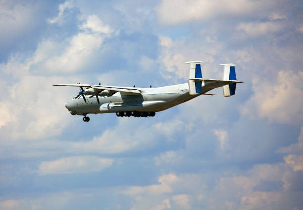 Small propeller airplane approaching the Quebec city airport during autumn day.