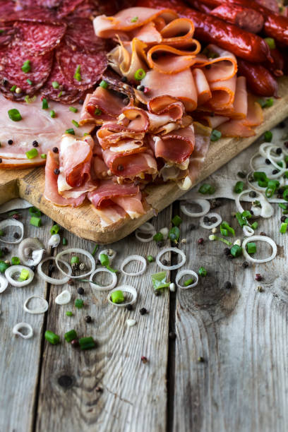 istock Ham, salami and sausages mix background 1124545633
