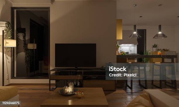Softly Illuminated Lounge And The Kitchen Stock Photo - Download Image Now - Living Room, Night, Dark