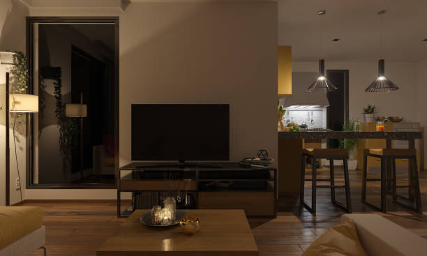 softly illuminated lounge and the kitchen - house night residential structure illuminated imagens e fotografias de stock