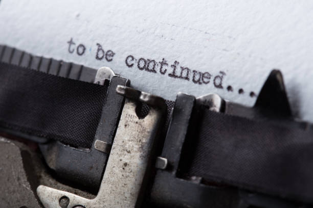 istock To be continued... typed words on a old Vintage Typewriter. Close up. 1124546153