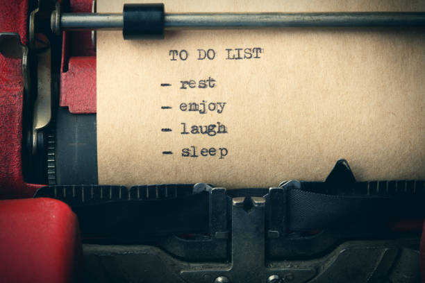 istock To do list sleep, relax, enjoy,laugh - text message on the typewriter close-up 1124548161