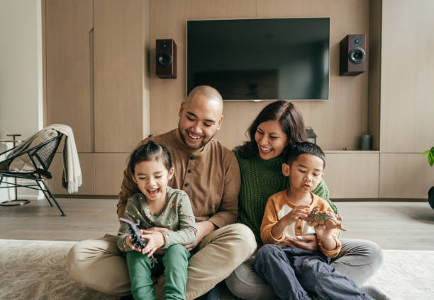 istock Family with two kids at home 1124551546