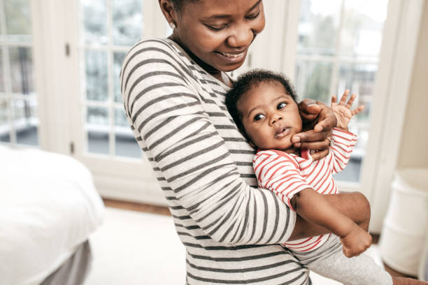 istock Mom and baby at home 1124551708