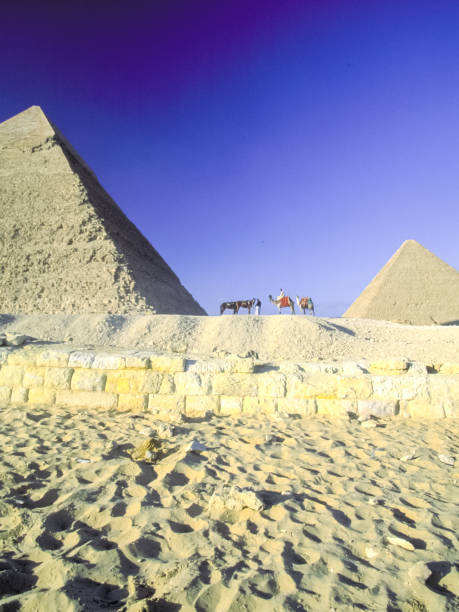 istock Attractions of Egypt. pyramids, camels and ruins. 1124552747