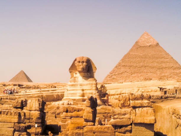 The Great Sphinx and the Pyramid of Khafre stand side by side, symbolizing the enduring legacy of ancient Egypt in Giza.