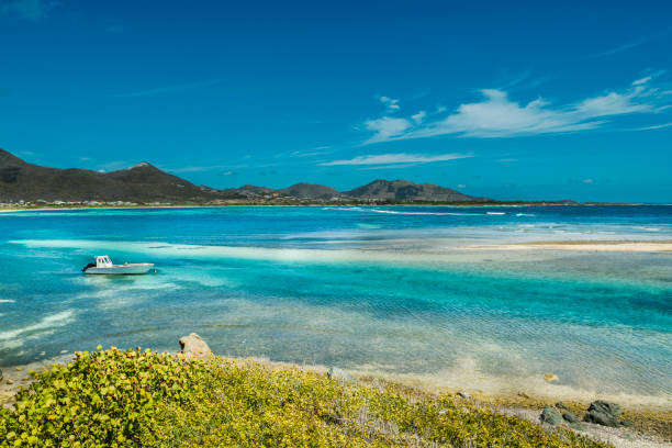 istock Boat in the Bay at St. Maarten 1124553559