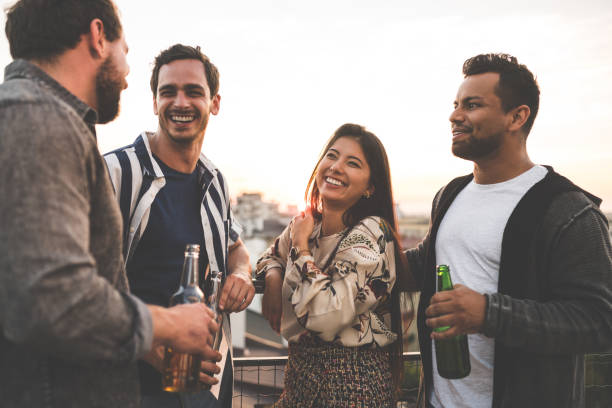 istock Multi-ethnic friends partying on the rooftop 1124555057