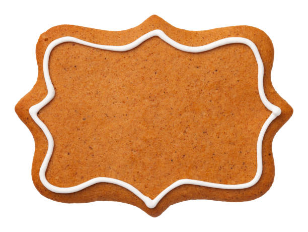 Gingerbread Label Cookie Isolated on White Background Gingerbread cookie in shape of label isolated on white background. Top view gingerbread biscuit stock pictures, royalty-free photos & images