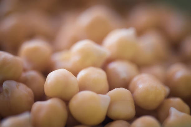 Chick peas in ceramic bowl, extreme close-up