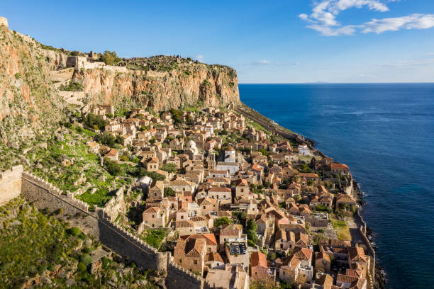 greece. old fortified town on an island - greece blue house wall imagens e fotografias de stock