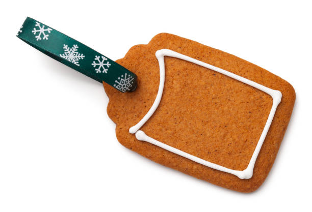 istock Gingerbread Label Cookie with Ribbon Isolated on White Background 1124563174