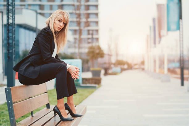 istock Business woman Sitting On The Bench 1124568433