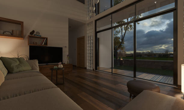 Dimly Illuminated Living Room with a View at Sunset