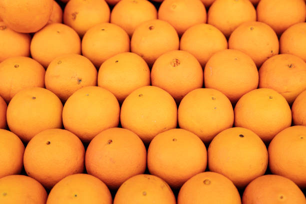 Closeup of sliced oranges on a market