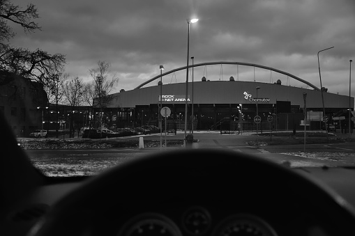 Chomutov, Czech republic - January 15, 2019: Rock NET arena viewed from Opel Astra cockpit in rainy evening