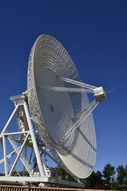 istock Array of satellite dishes or radio antennas against sky. Space observatory. 1124582912
