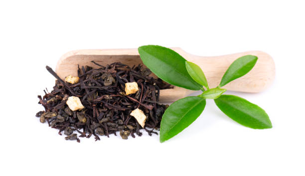 istock Black and green Ceylon tea with apple and bergamot, isolated on white background. 1124583905