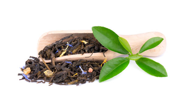 istock Green Ceylon tea with cornflower and candied fruit, isolated on white background. 1124583957