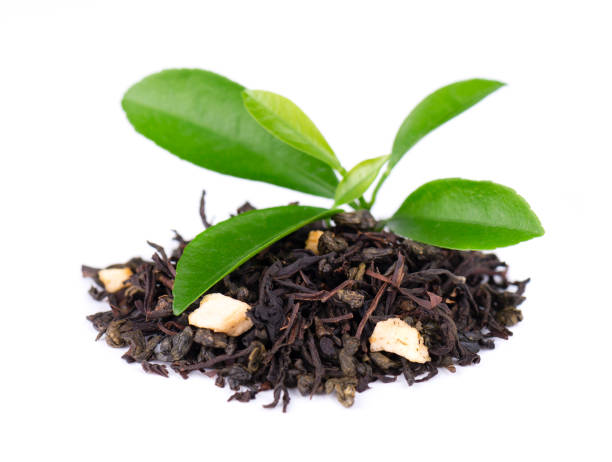 istock Black and green Ceylon tea with apple and bergamot, isolated on white background. 1124584071