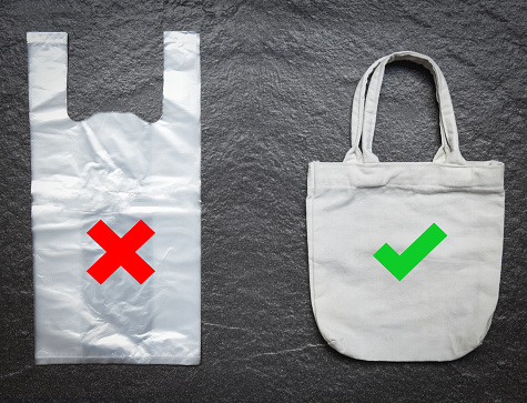 No plastic bag / Use tote bag canvas fabric cloth shopping replace say no to plastic bags on stone dark background - Pollution problem concept