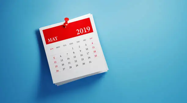 Photo of Post It May 2019 Calendar On Blue Background