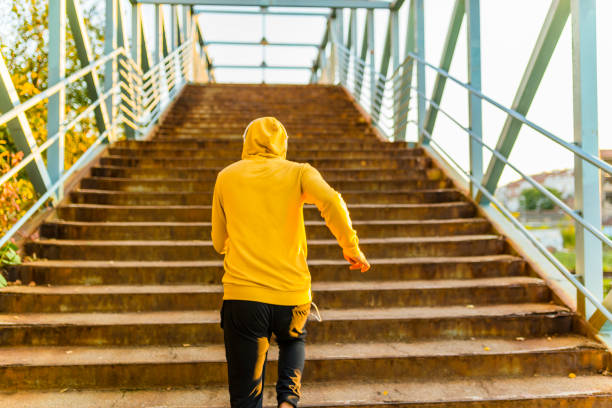 istock Young Athlete Running on the Stairways 1124592812